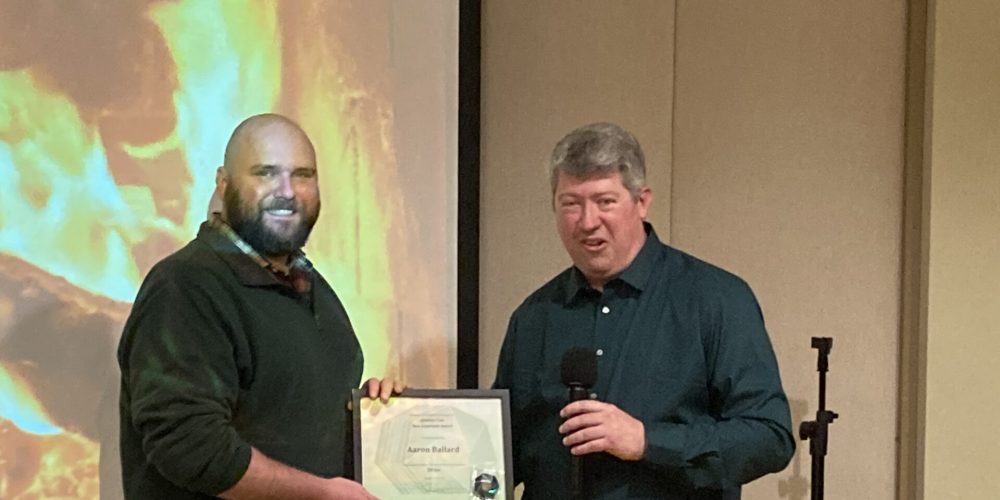 Aaron Ballard receiving reward for Drive